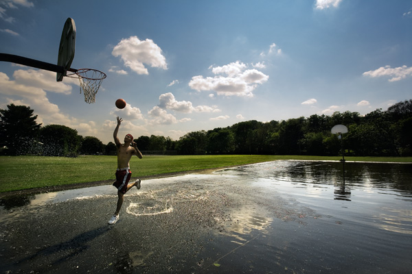 Cousin Mike on a Flooded Basketball Court